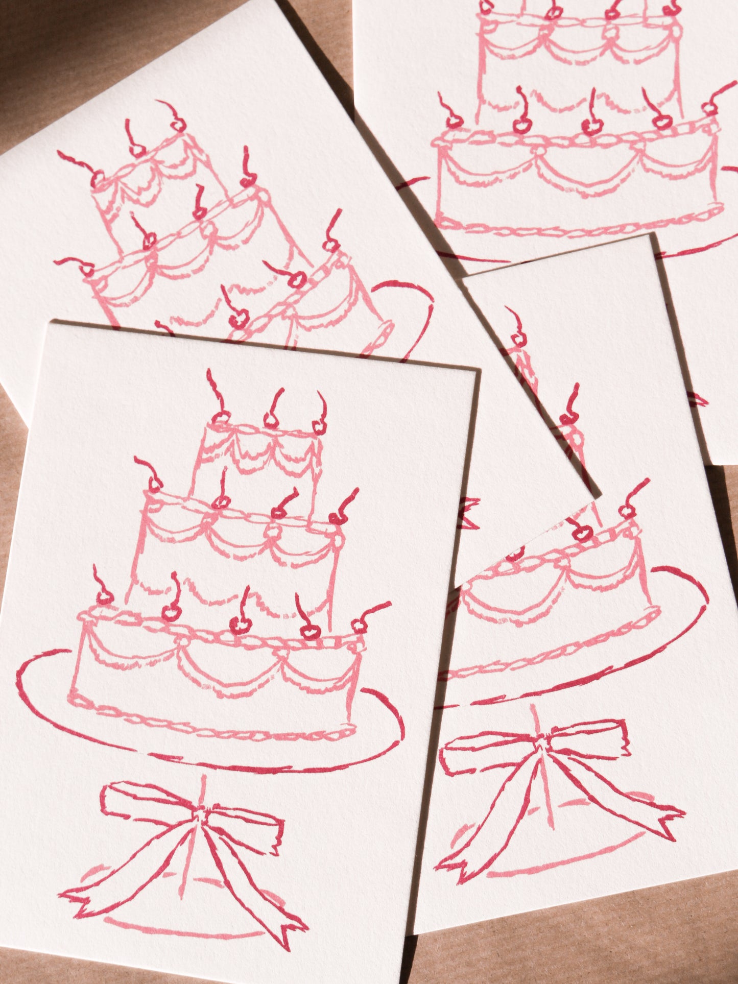 Postcard of a pink cake (risograph)